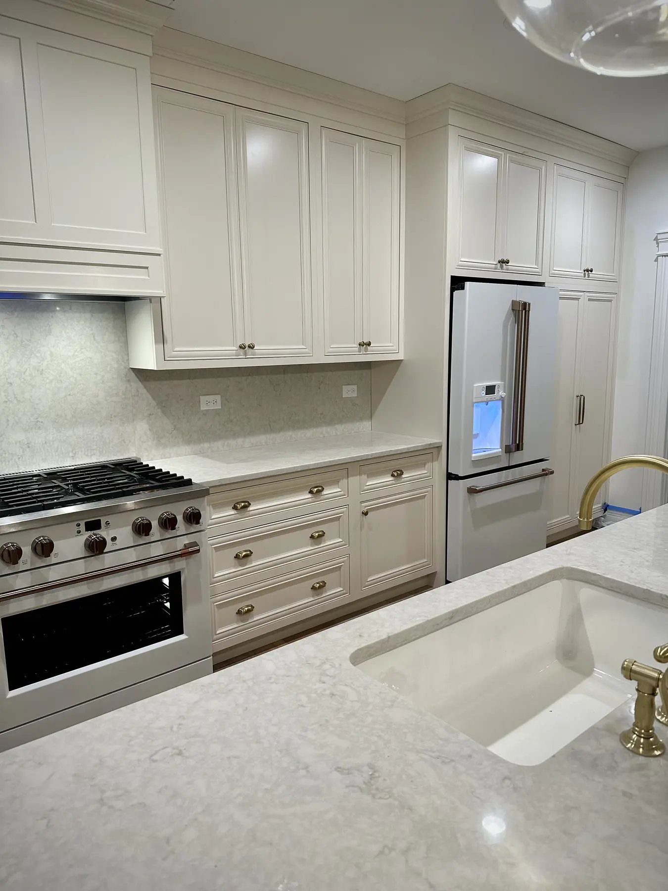 Custom kitchen cabinetry and stone countertops