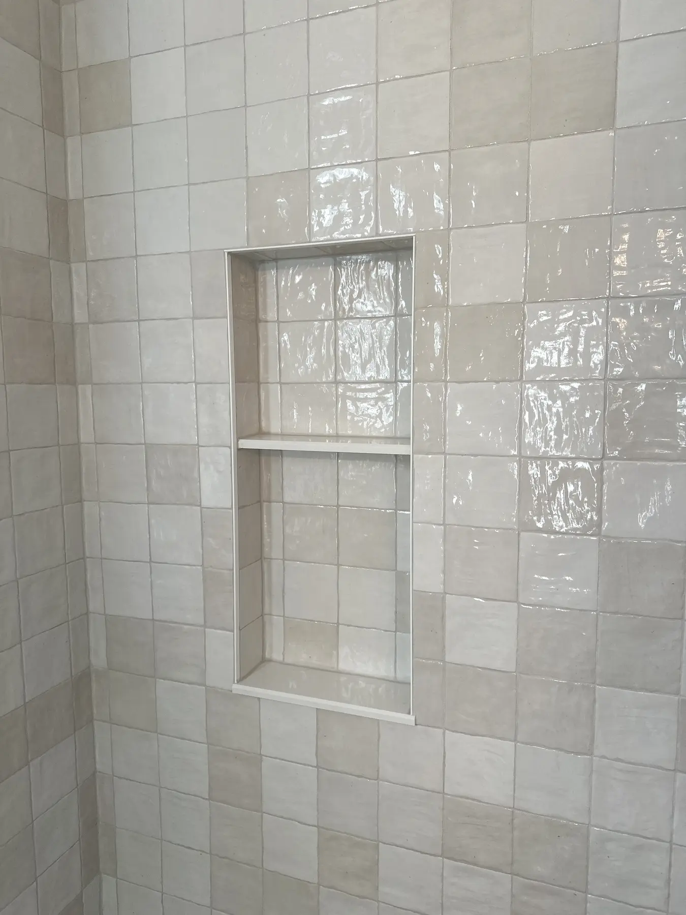 Tiled shower with built-in wall niche